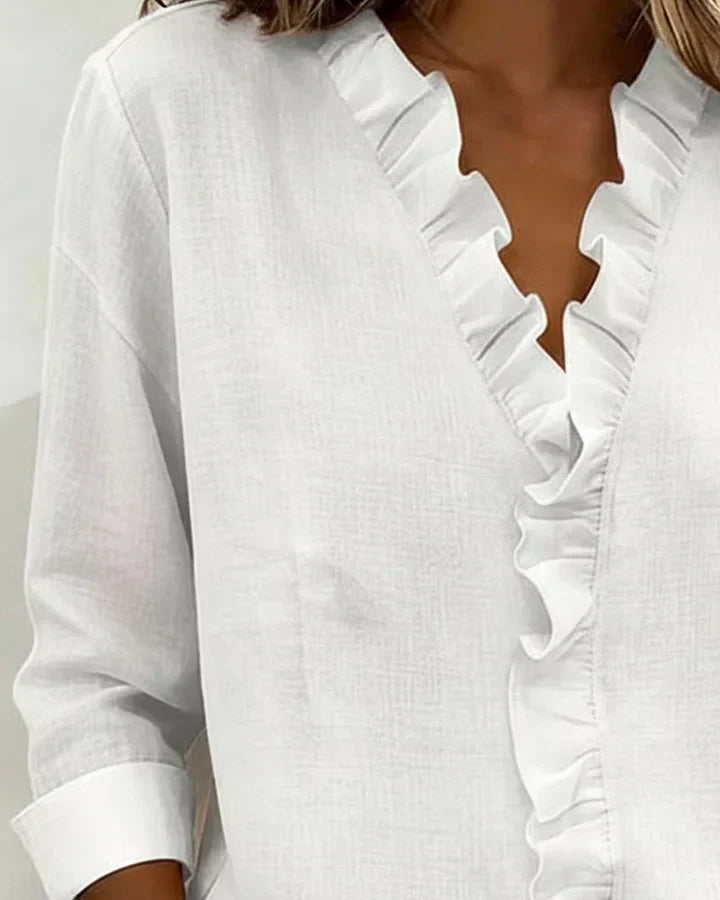 Irene | Blusa elegante con volantes, escote en V y mangas largas