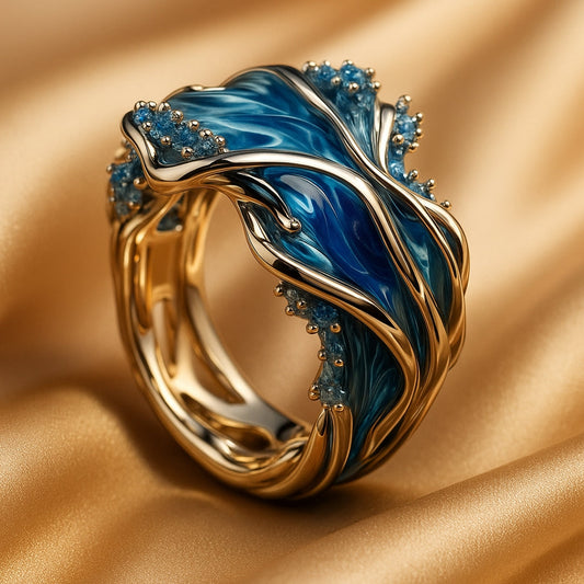 Anillo vintage dorado con olas del mar